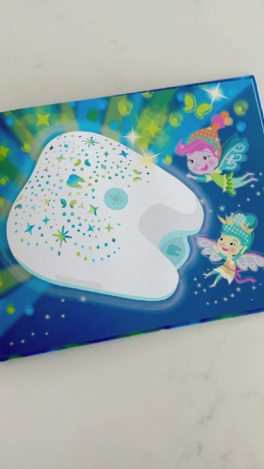 Video of The Tooth Fairy Flylight Storybook pages that explain why the tooth fairies invented The Flylight